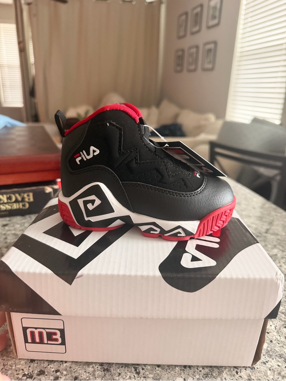 Fila Kids Black and Red High-Top Sneakers - Bold Sporty Design